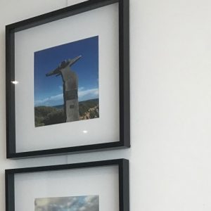 hanging in a column using a picture hanging system